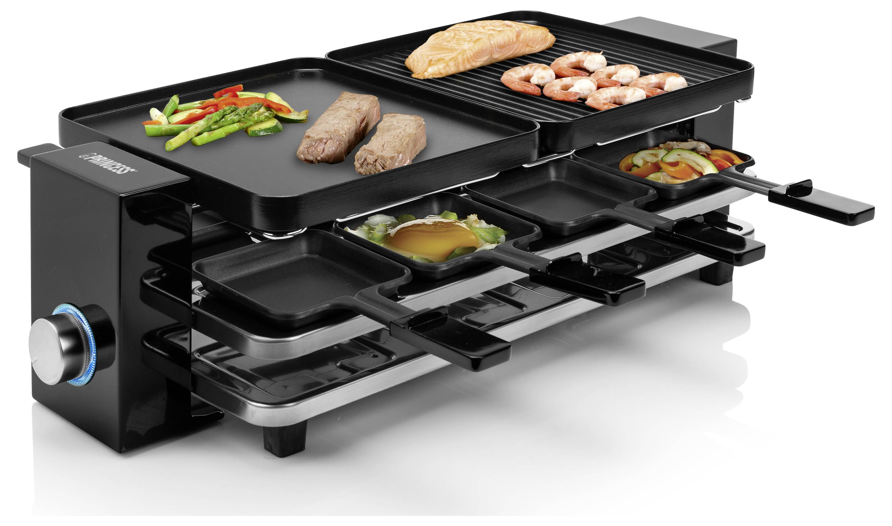 Elektrischer Tischgrill mit mehreren Kochplatten, auf denen Gemüse, Lachs, Garnelen, Steak und Eier liegen; seitliche Drehregler zur Wärmeregelung.