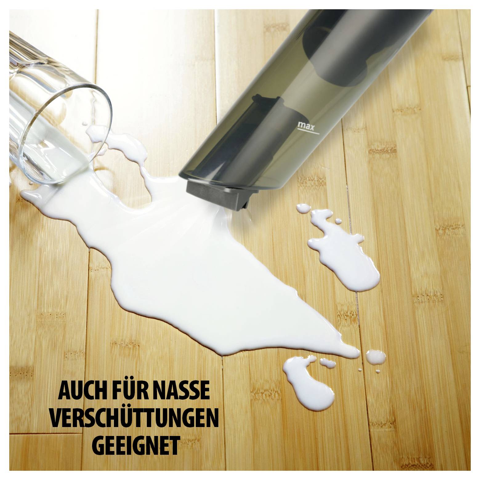 Werbung für einen Staubsauger: Er saugt verschüttete Flüssigkeit von einem Holzboden auf; Text: 'AUCH FÜR NASSE VERSCHÜTTUNGEN GEEIGNET'<br>