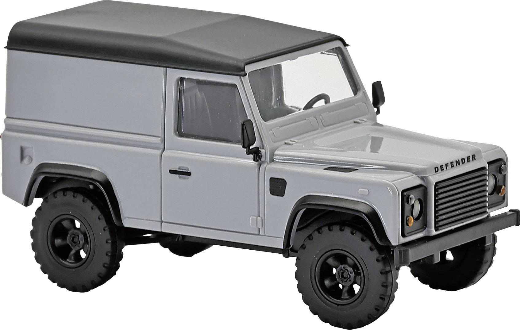 Grauer Land Rover Defender-ähnliches Geländefahrzeug im Geländewagen-Stil mit schwarzem Dach, dargestellt in der Seitenansicht auf weißem Hintergrund.