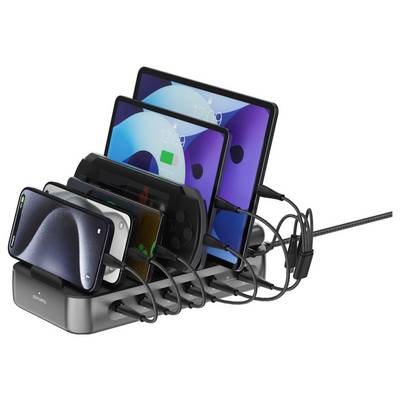 Mehrgeräte-Ladestation mit mehreren Telefonen und Tablets, die mit Kabeln angeschlossen sind und mehrere Geräte gleichzeitig aufladen.