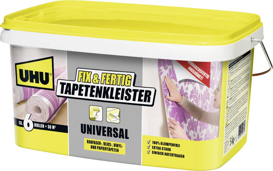 Ein gelb verschlossener UHU 'Fix & Fertig Tapetenkleister' Behälter mit universalem Tapetenkleister zum Aufhängen von Tapeten.