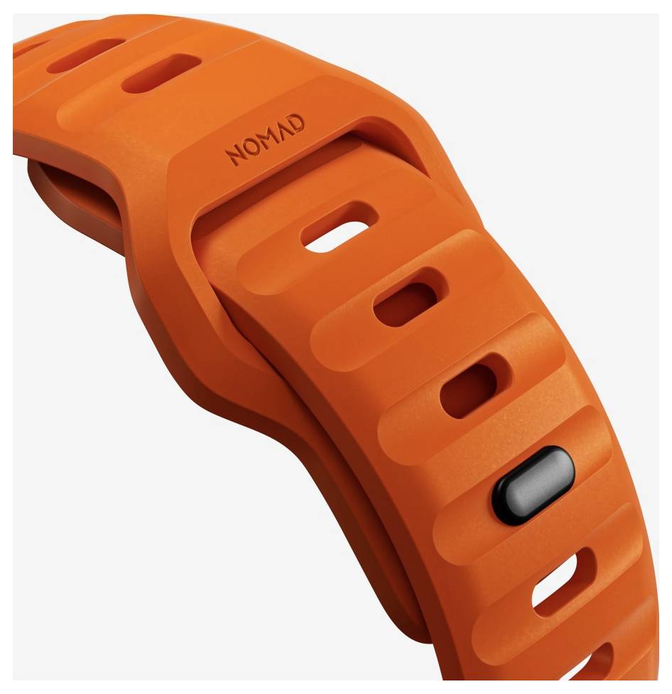 Orangefarbenes Nomad Smartwatch-Armband mit perforierten Löchern und schwarzer Schnalle auf weißem Hintergrund.