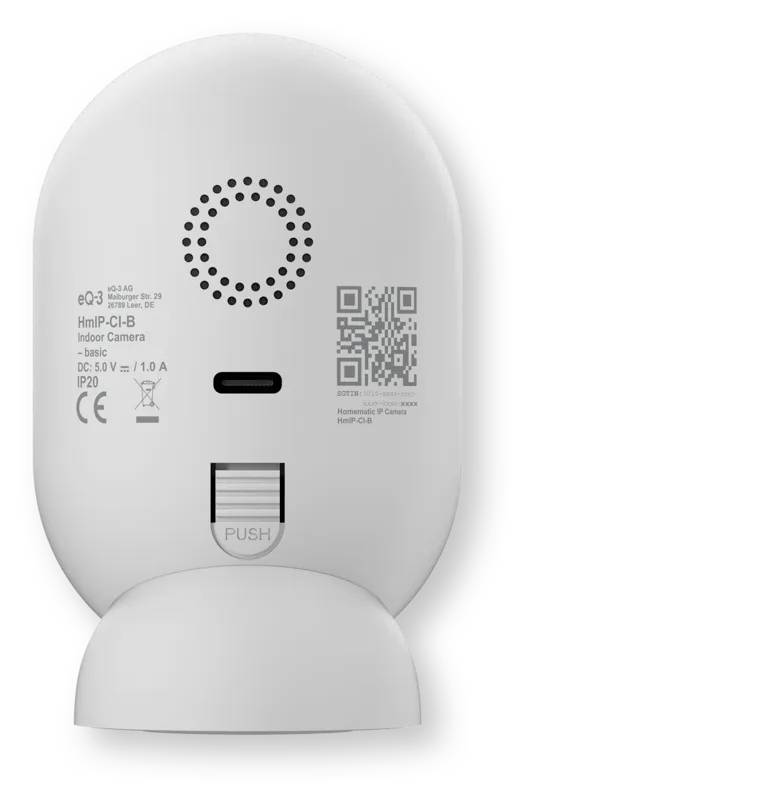 Rückansicht einer weißen Indoor-Sicherheitskamera mit Lautsprecherlöchern, QR-Code, Stromversorgungsetikett und "PUSH"-Taste auf der Basis.
