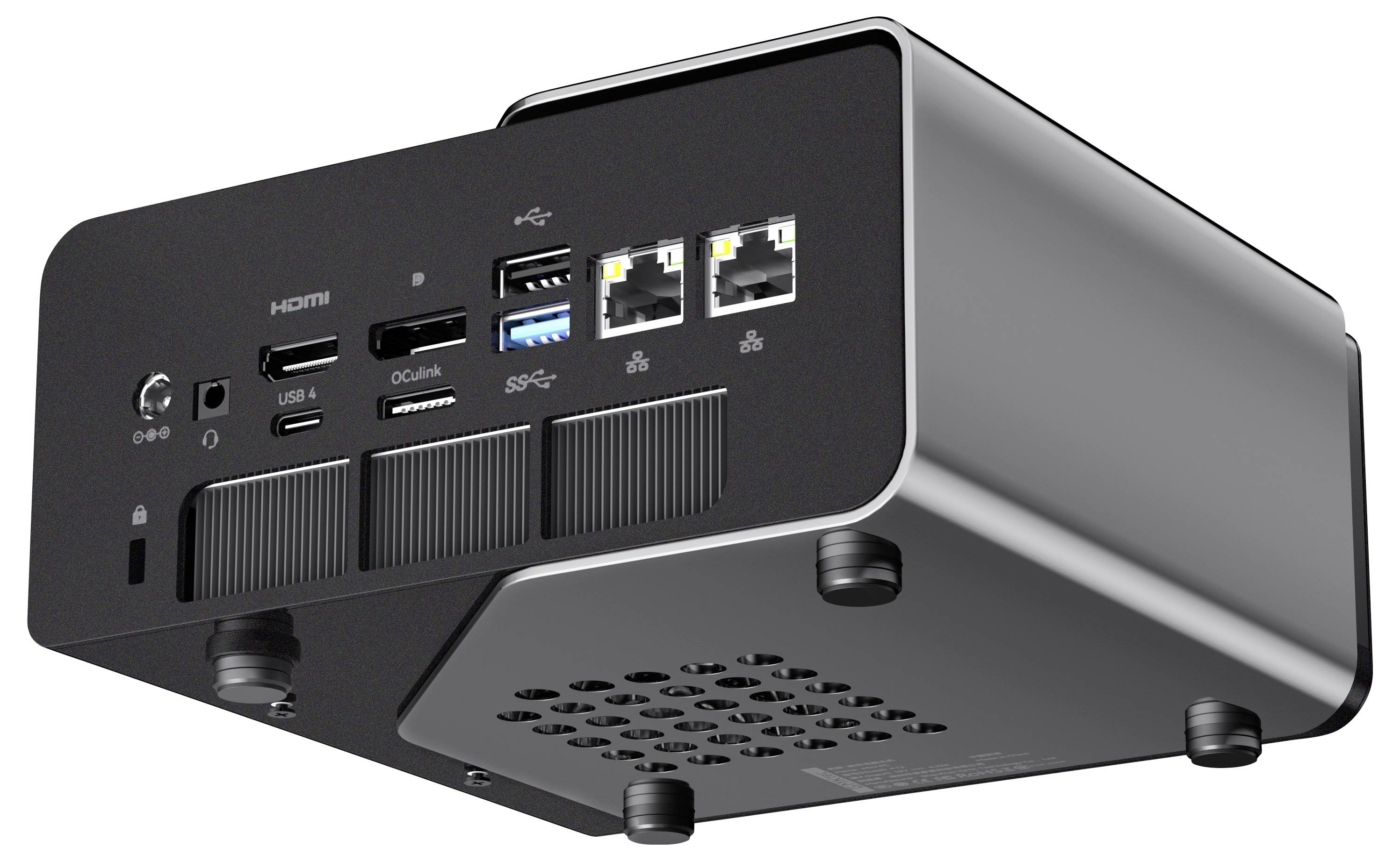 Kompakter schwarzer Mini-PC von unten gezeigt, mit HDMI, USB, Audio, Ethernet und anderen Anschlüssen auf der Frontblende sichtbar.