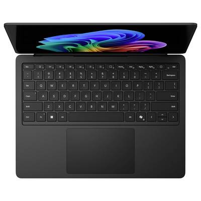 Offener Laptop mit einem farbenfrohen abstrakten Hintergrundbild auf dem Bildschirm und einer schwarzen Tastatur mit großem Trackpad, von oben betrachtet.