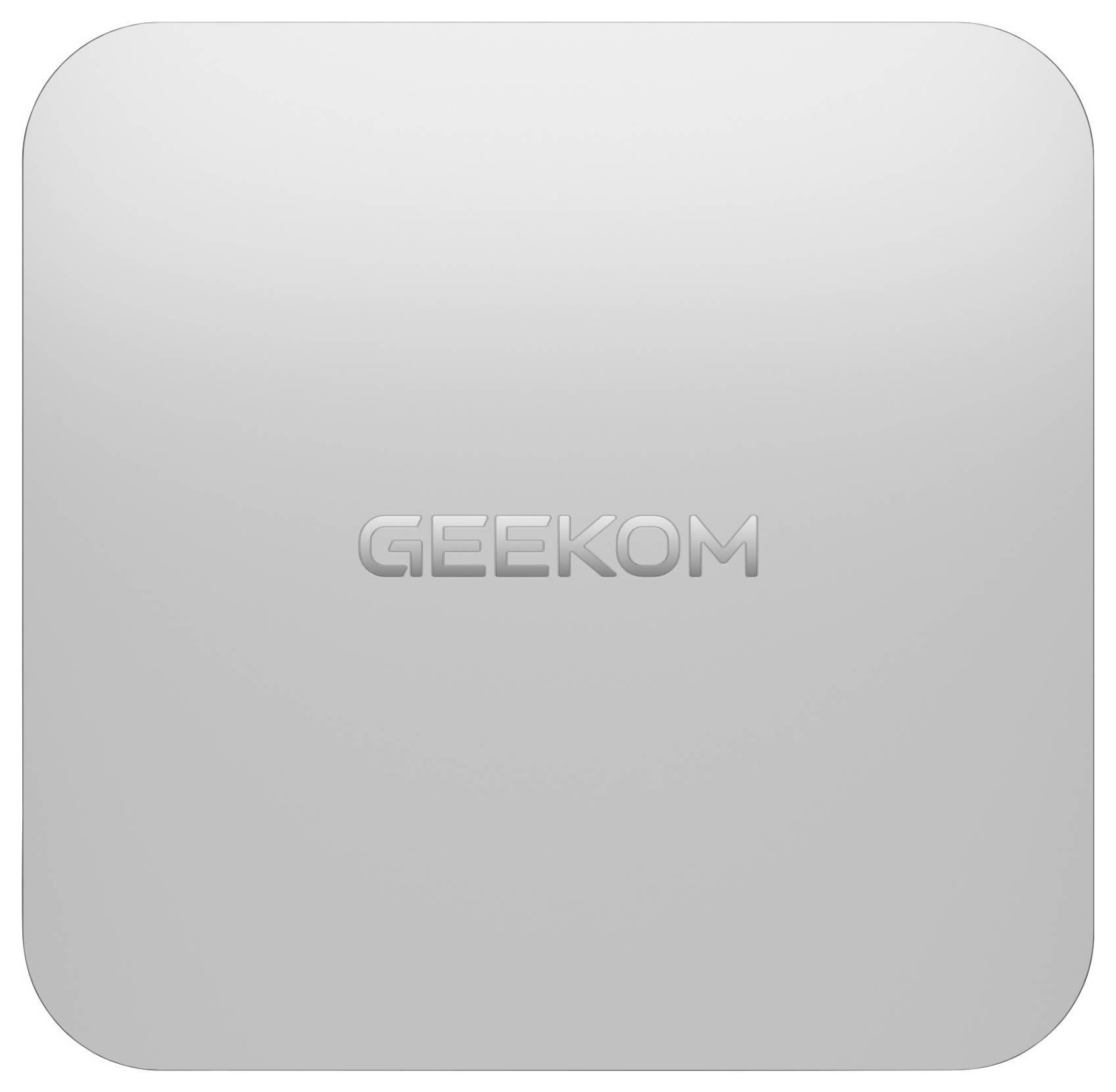 Silbernes quadratisches GEEKOM-Gerät mit abgerundeten Ecken und zentriertem geprägtem Logo auf einfachem Hintergrund.