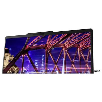 Ein Laptop zeigt eine lebendige Stadtbrücke nachts mit rot beleuchteten Stahlträgern; das AMD-Logo erscheint in der unteren rechten Ecke.