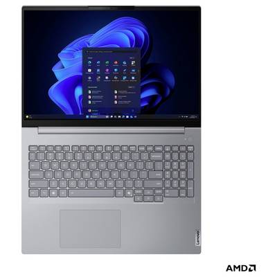 Grauer Lenovo-Laptop mit Windows 11-Desktop und Startmenü auf dem Bildschirm, mit AMD-Branding in der unteren rechten Ecke.