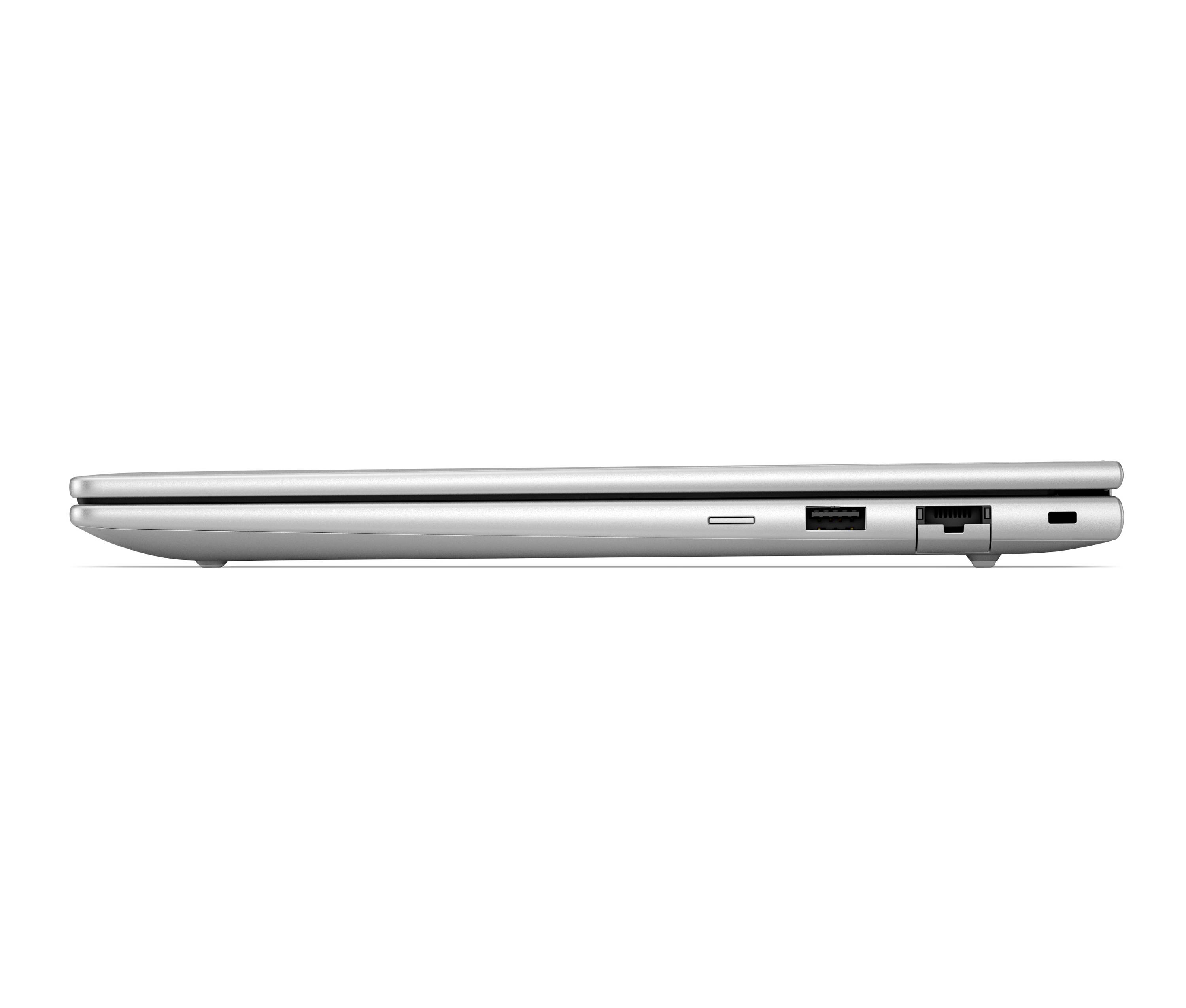 Seitenansicht eines silbernen Laptops, zugeklappt, mit sichtbaren USB-, Ethernet- und Stromanschlüssen an der Kante.