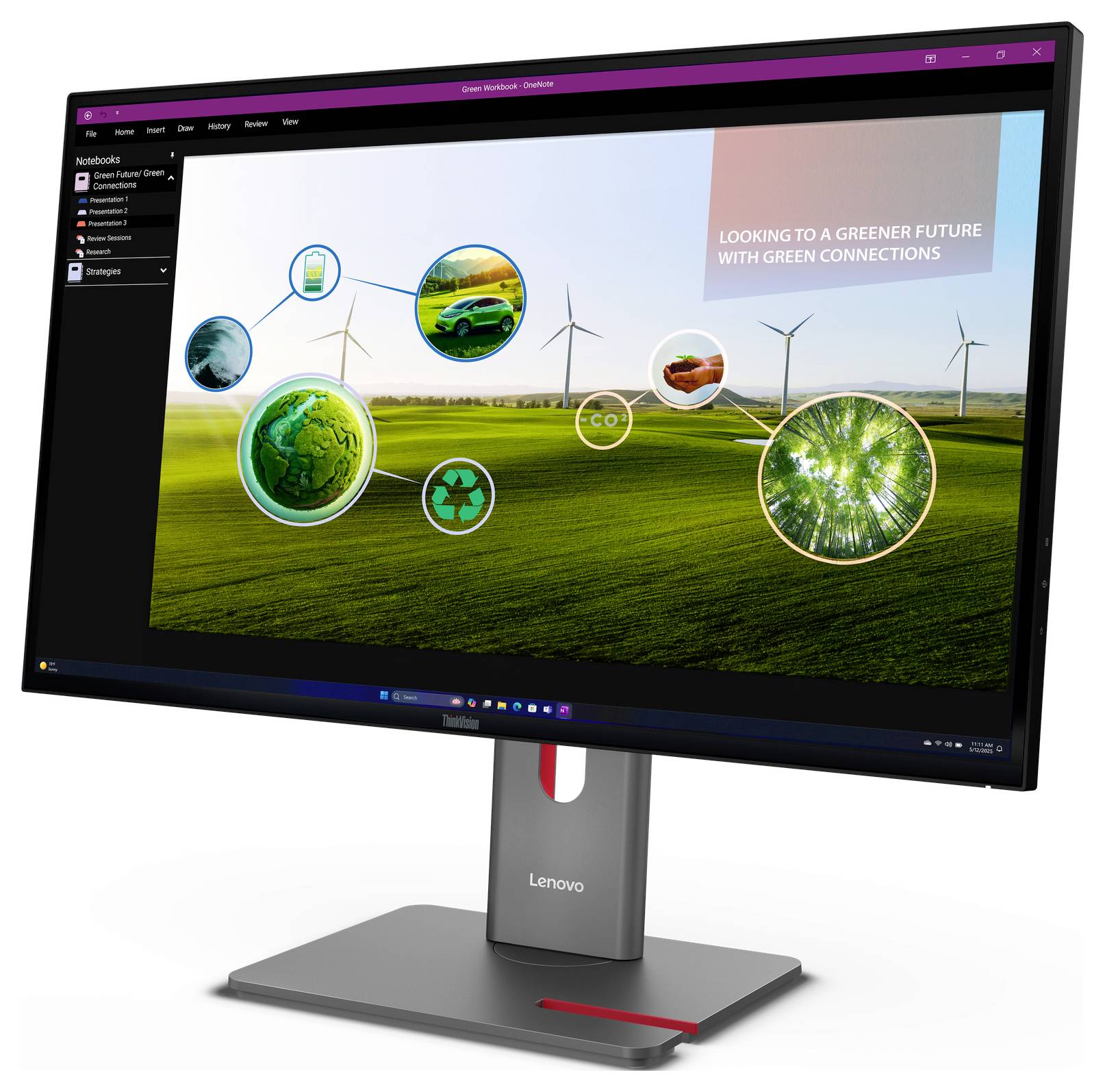 Lenovo-Monitor zeigt eine Präsentation über grüne Energie mit Windkraftanlagen, Öko-Symbolen und dem Text „Mit grünen Verbindungen auf dem Weg zu einer grüneren Zukunft".