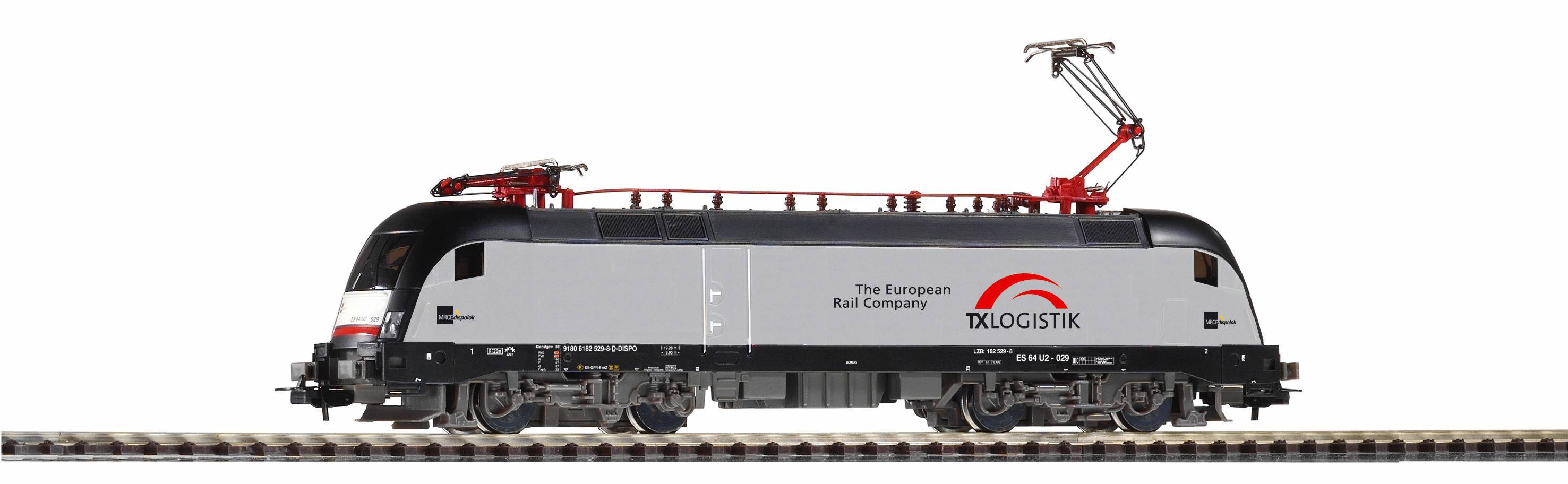 Seitenansicht einer schwarzgrauen elektrischen Lokomotive mit der Aufschrift „The European Rail Company" und „TOLOGISTIC" auf Schienen.