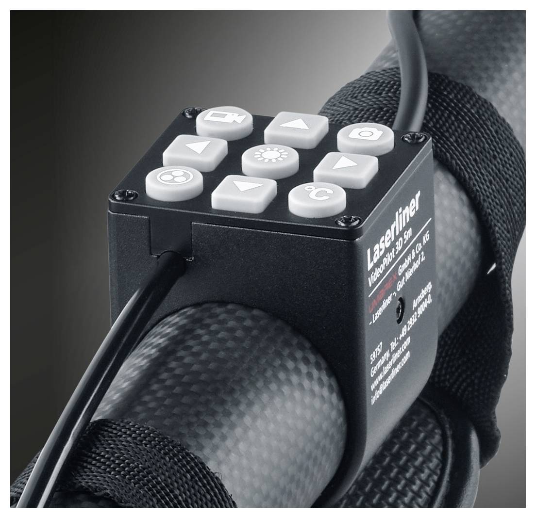 Nahaufnahme eines Laserliner Velimex 8,4V-Steuermoduls mit weißen Tasten, das auf einem schwarzen Gerät mit Riemen montiert ist, wahrscheinlich zum Einstellen einer Maschine oder Kamerarig.
