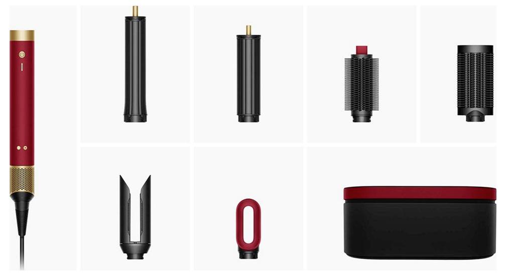 Produktteile-Layout mit einem rot-schwarzen Haarstyling-Gerät mit austauschbaren Aufsätzen: Rundbürsten, Diffusor, Konzentrator und Aufbewahrungskoffer.