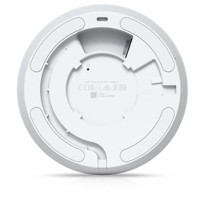 Draufsicht auf ein rundes, weiß an der Decke montiertes Gerät, wahrscheinlich ein Rauchmelder oder Sensor, mit Lüftungsöffnungen und einem zentralen Etikett.