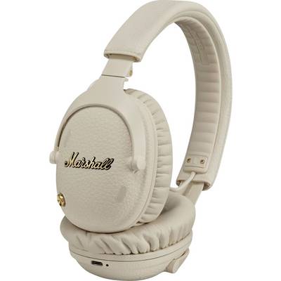 Beige Marshall Over-Ear-Kopfhörer, zusammengeklappt, vor weißem Hintergrund gezeigt.