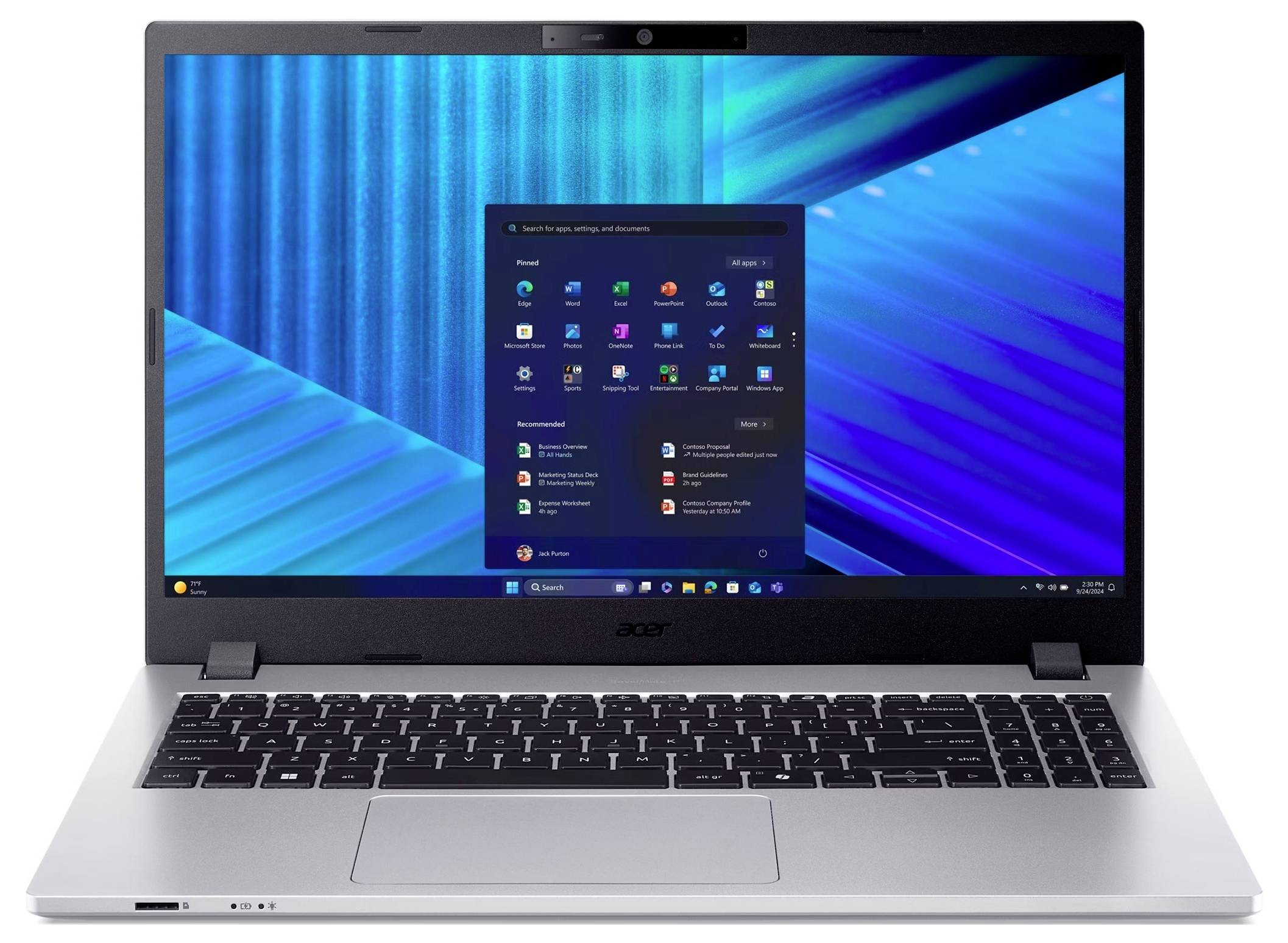 Ein silberner Acer-Laptop zeigt das Windows 11-Startmenü auf einem blauen abstrakten Hintergrund an.