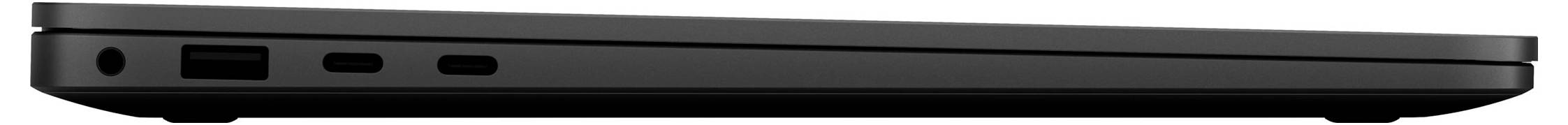 Seitenansicht eines geschlossenen schwarzen Laptops, die die dünne Kante mit mehreren Anschlüssen und Belüftungsöffnungen zeigt.