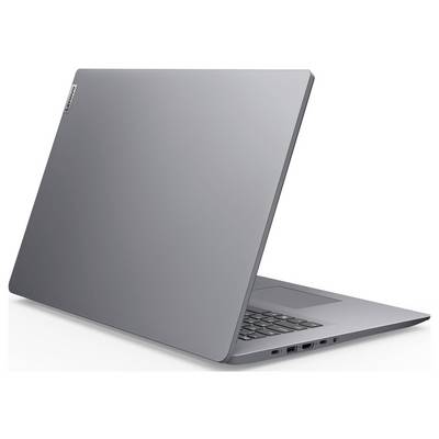 Geschlossener silberner Laptop von hinten-links betrachtet, das schlanke modernes Design und einen Teil der Tastatur und Anschlüsse zeigend