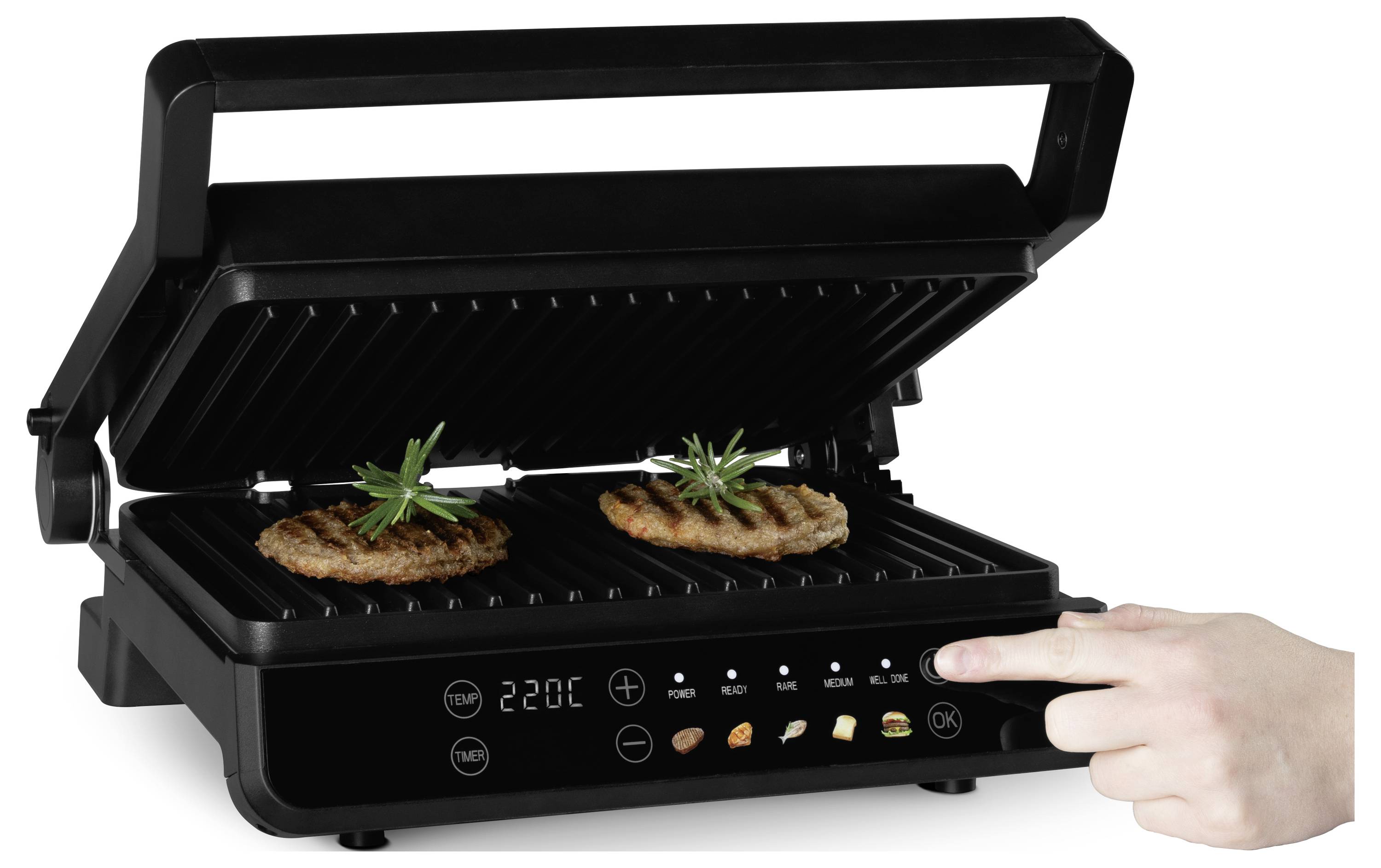 Offener elektrischer Kontaktgrill mit zwei Patties beim Kochen; eine Hand drückt auf die Displayanzeige des Bedienfelds.
