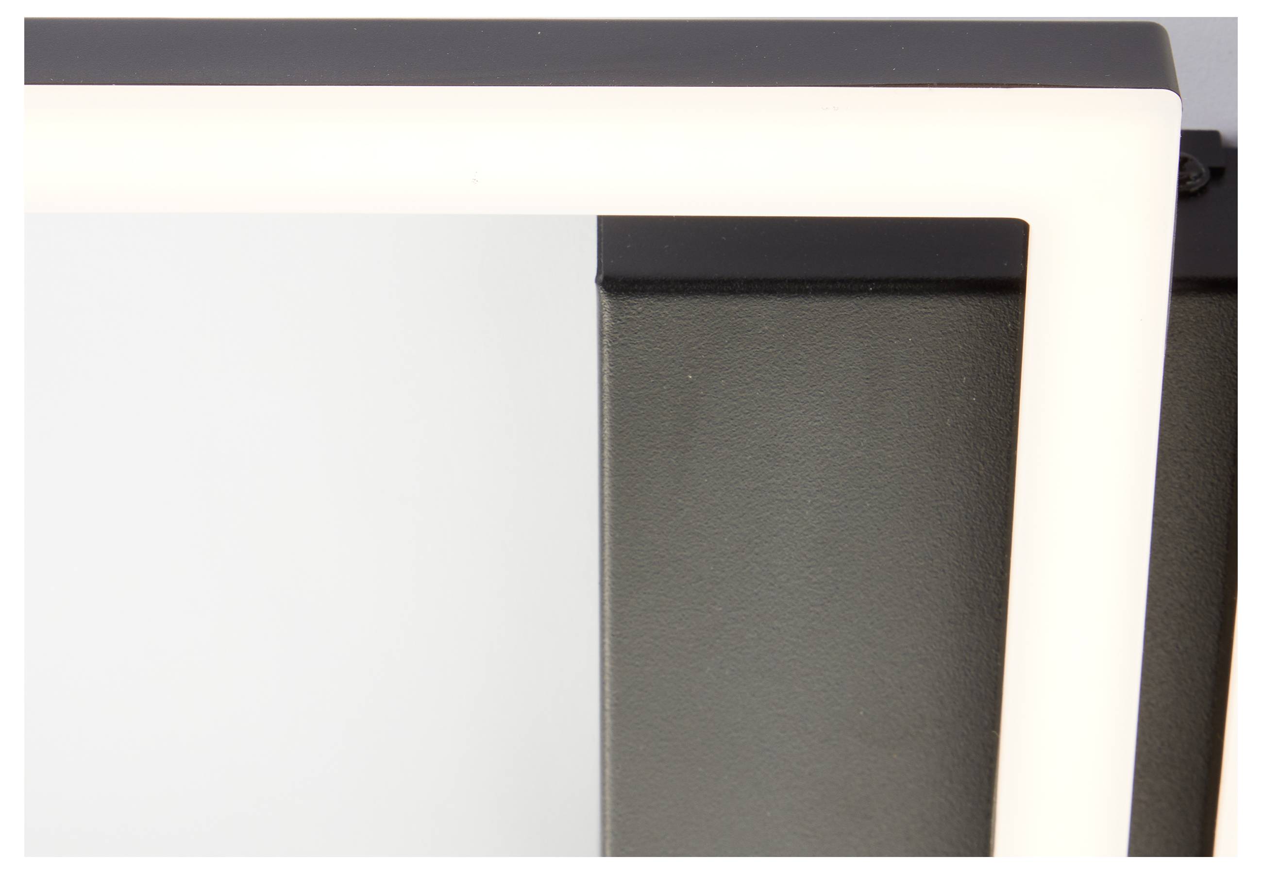 Nahaufnahme eines modernen LED-Leuchtpanels mit leuchtend weißem glühenden Rand und dunkelm zentralem Träger.
