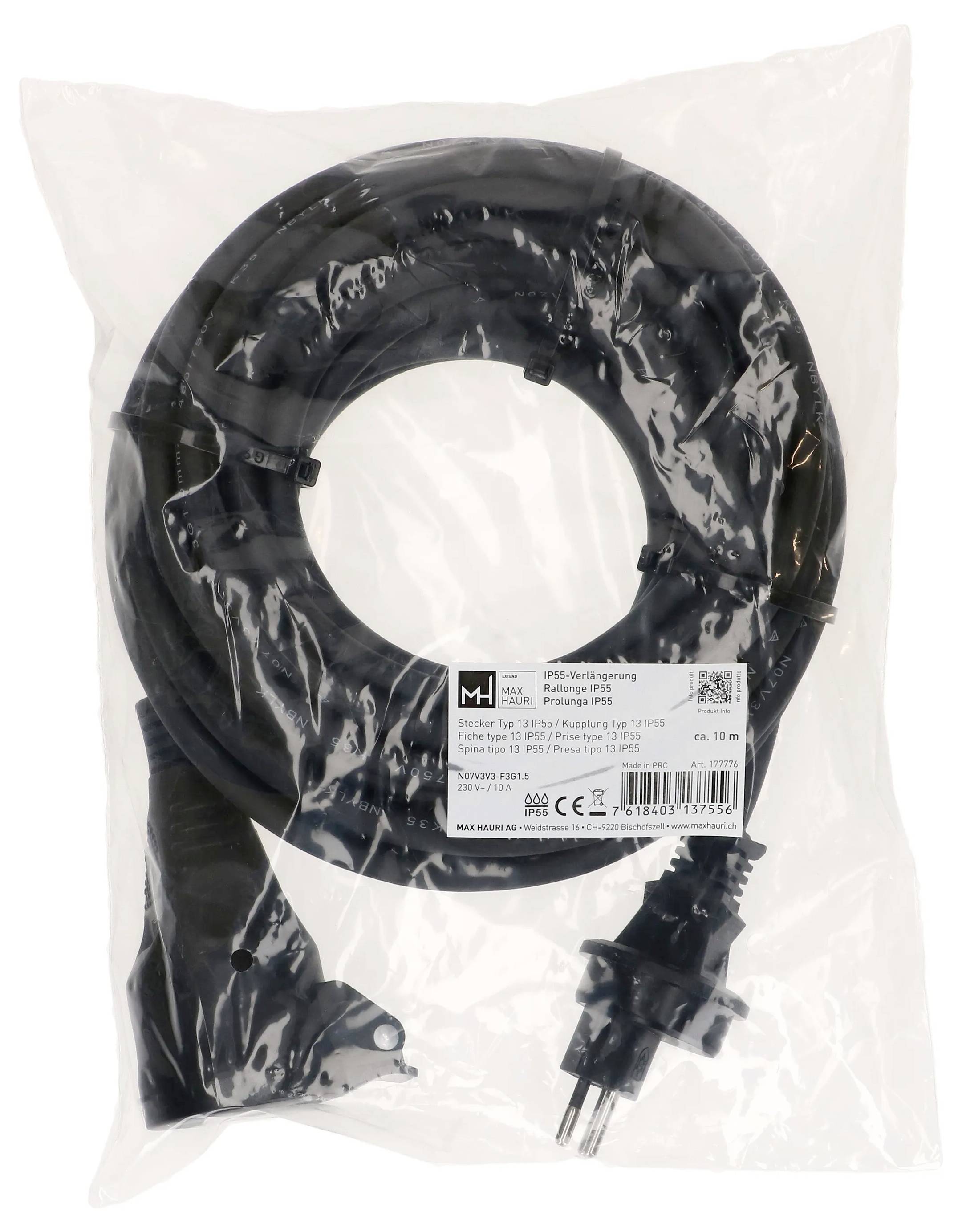 Ein aufgewickeltes schwarzes Stromkabel in durchsichtiger Kunststoffverpackung mit weißem Produktetikett und sichtbarem zweipoliger Stecker.