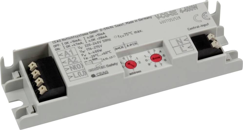 Weißer elektronischer Beleuchtungs-Transformator oder Treiber mit Klemmleisten, bedruckten Verdrahtungsetiketten und zwei roten Einstellreglern auf einem grauen Gehäuse.