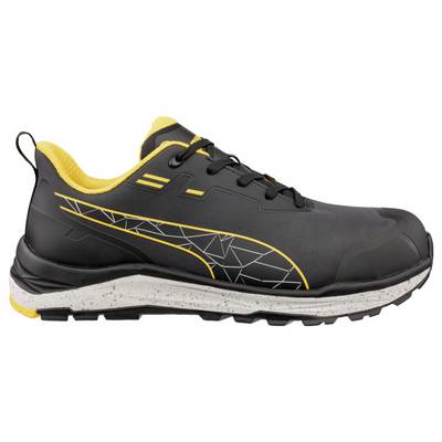 Schwarzer und gelber Sportlaufschuh in Seitenansicht, mit robuster Sohle und geometrischem Seitenmuster.
