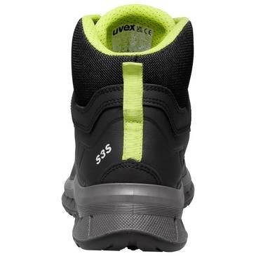 Schwarzer und grauer Uvex-Arbeitsstiefel von hinten betrachtet, mit neongrüner Auskleidung und Anziehtab.