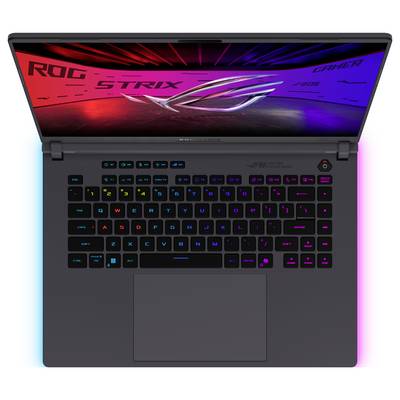 Offener Gaming-Laptop mit RGB-Tastatur und großem Touchpad; der Bildschirm zeigt „ROG STRIX"-Gaming-Grafiken und „GAMER"-Branding.