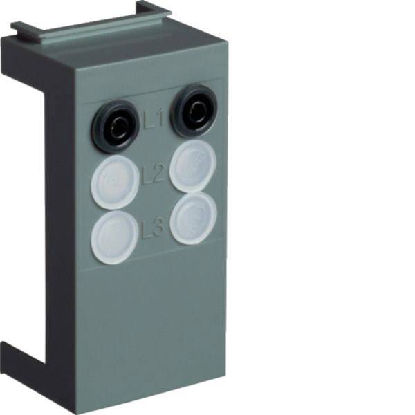 Graues Elektromodul mit zwei schwarzen und vier weißen kreisförmigen Anschlüssen mit den Bezeichnungen L1, L2 und L3 auf weißem Hintergrund.