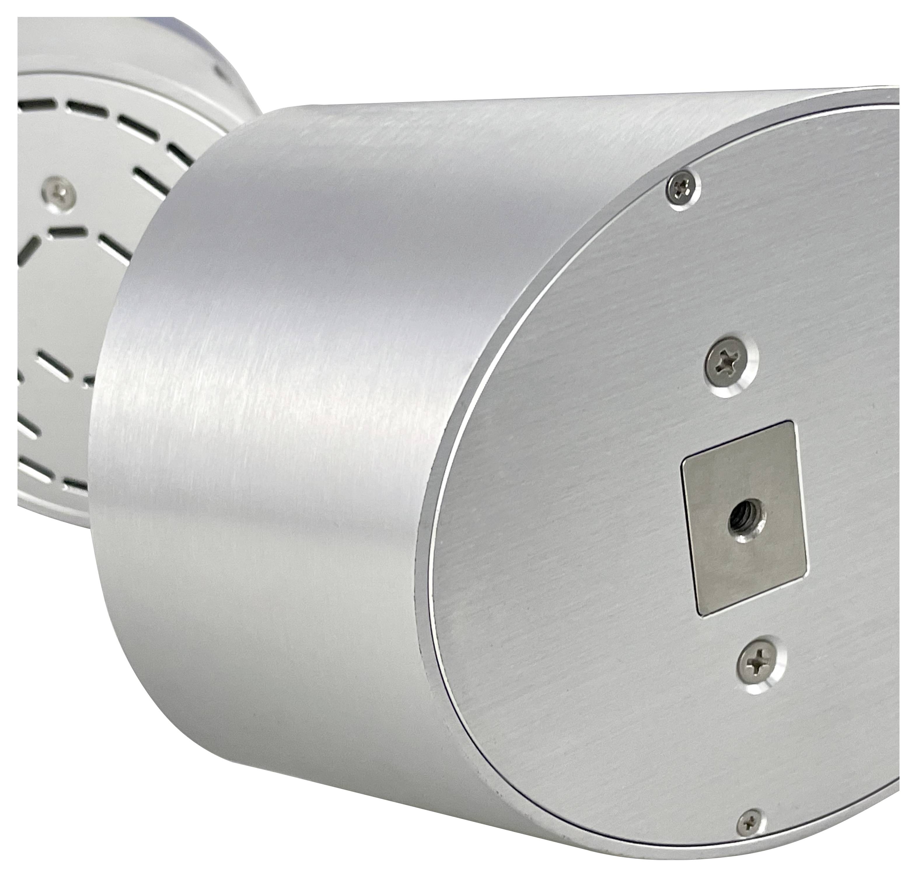 Nahaufnahme eines gebürsteten metallischen zylindrischen Hardwaregeräts mit einer runden Endplatte, sichtbaren Schrauben und einem zentralen Montageloch.
