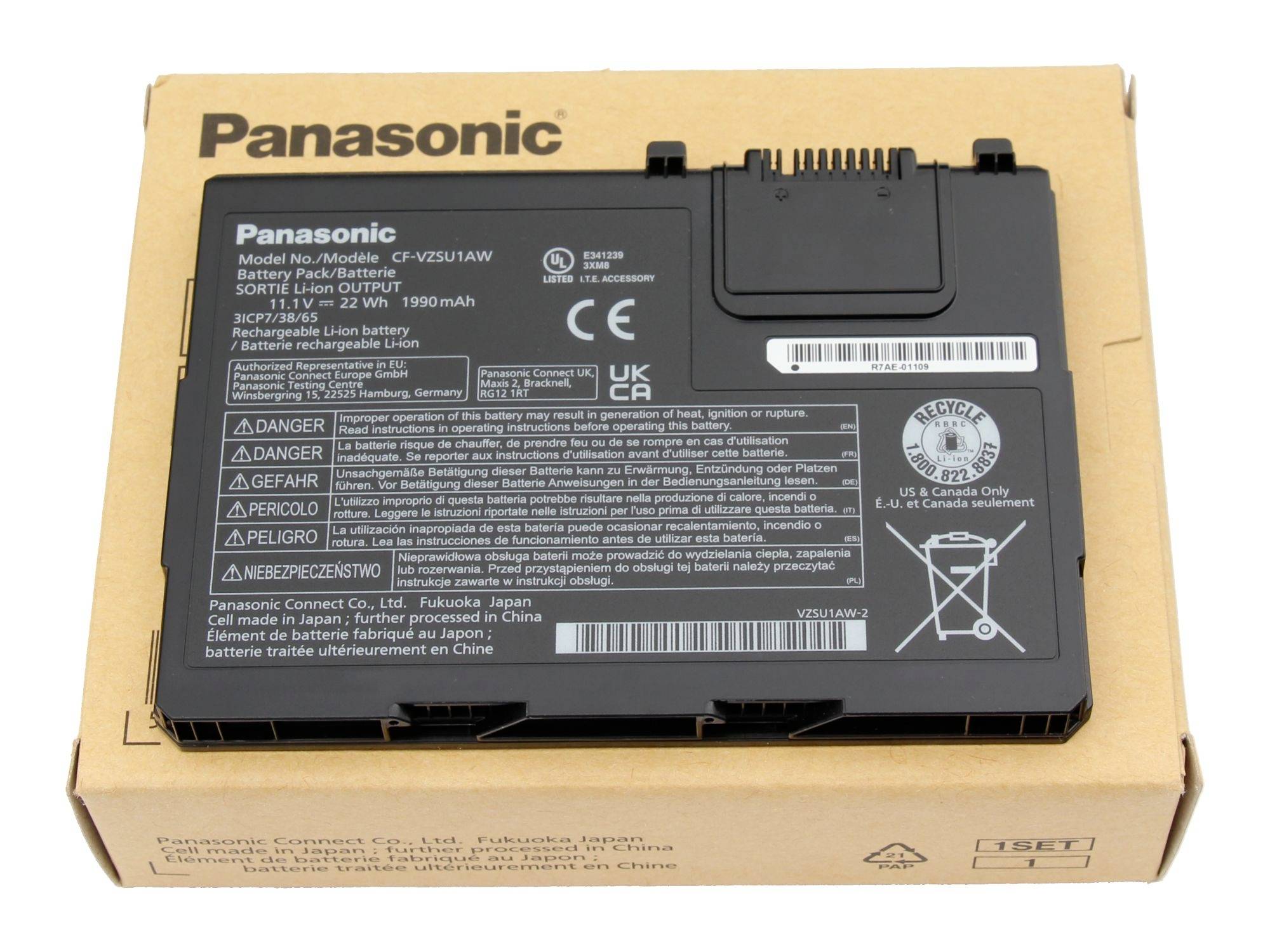 Wiederaufladbare Lithium-Ionen-Laptop-Batterie von Panasonic auf ihrer Pappschachtel, mit dem Modell CF-VZSU1AW gekennzeichnet und mit Warn- und Recycling-Symbolen versehen.