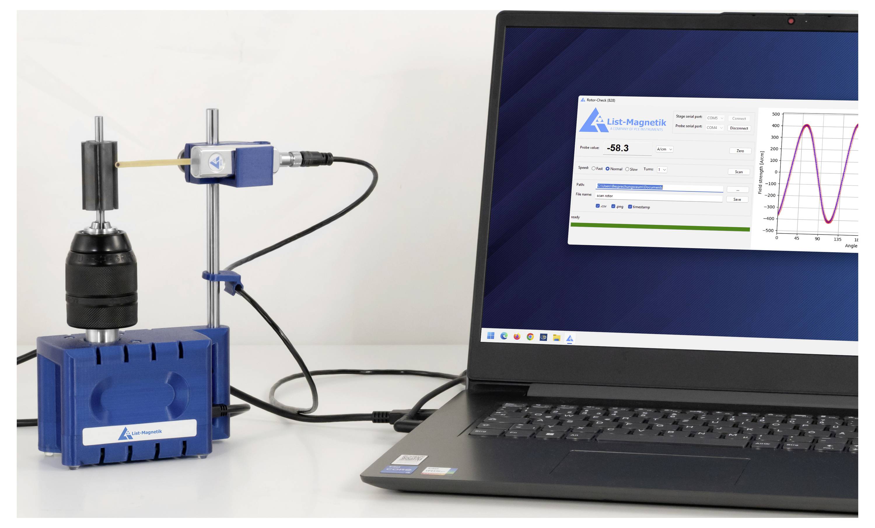 Laboraufbau mit einem motorisierten Gerät, das auf einer blauen Basis montiert ist und über ein Kabel mit einem Laptop verbunden ist, auf dem Steuerungssoftware und ein Live-Diagramm angezeigt werden.