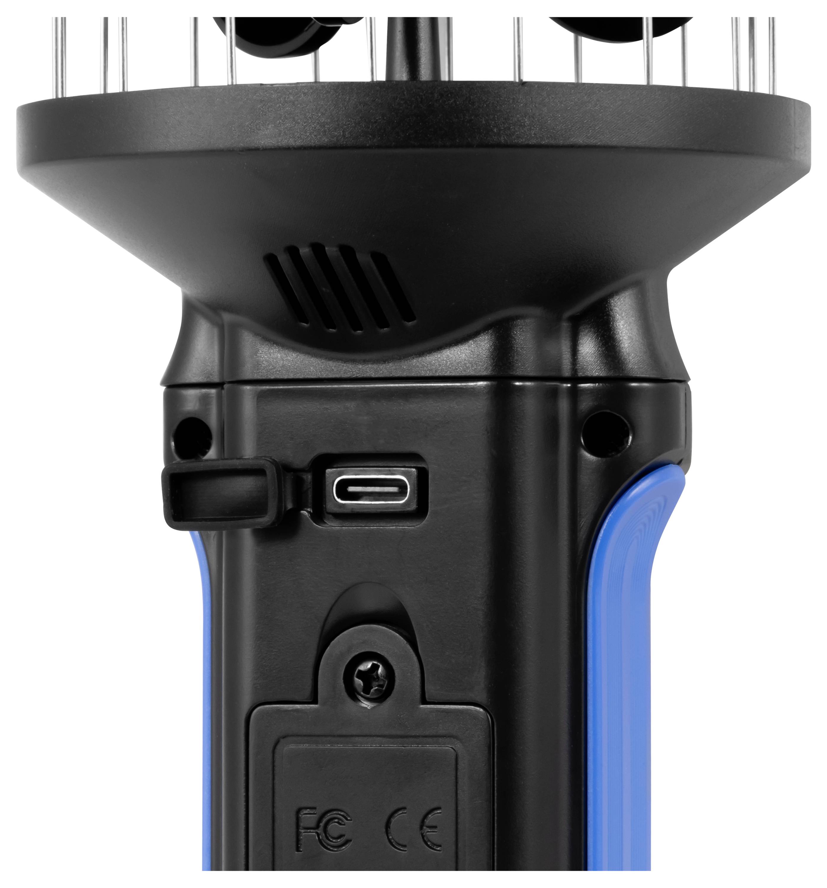Nahaufnahme eines schwarz-blauen elektronischen Geräts mit einem USB-C-Ladeanschluss und Stromschalter unter einem belüfteten oberen Abschnitt.