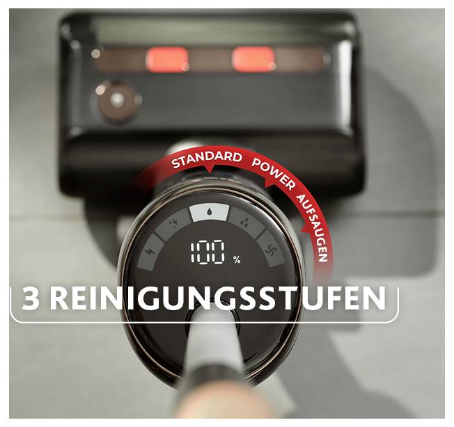 Nahaufnahme eines Staubsauger-Griffs mit Anzeige '100 %' und Umschalter für 'Standard' und 'Power'; unten steht '3 Reinigungsstufen'.<br>