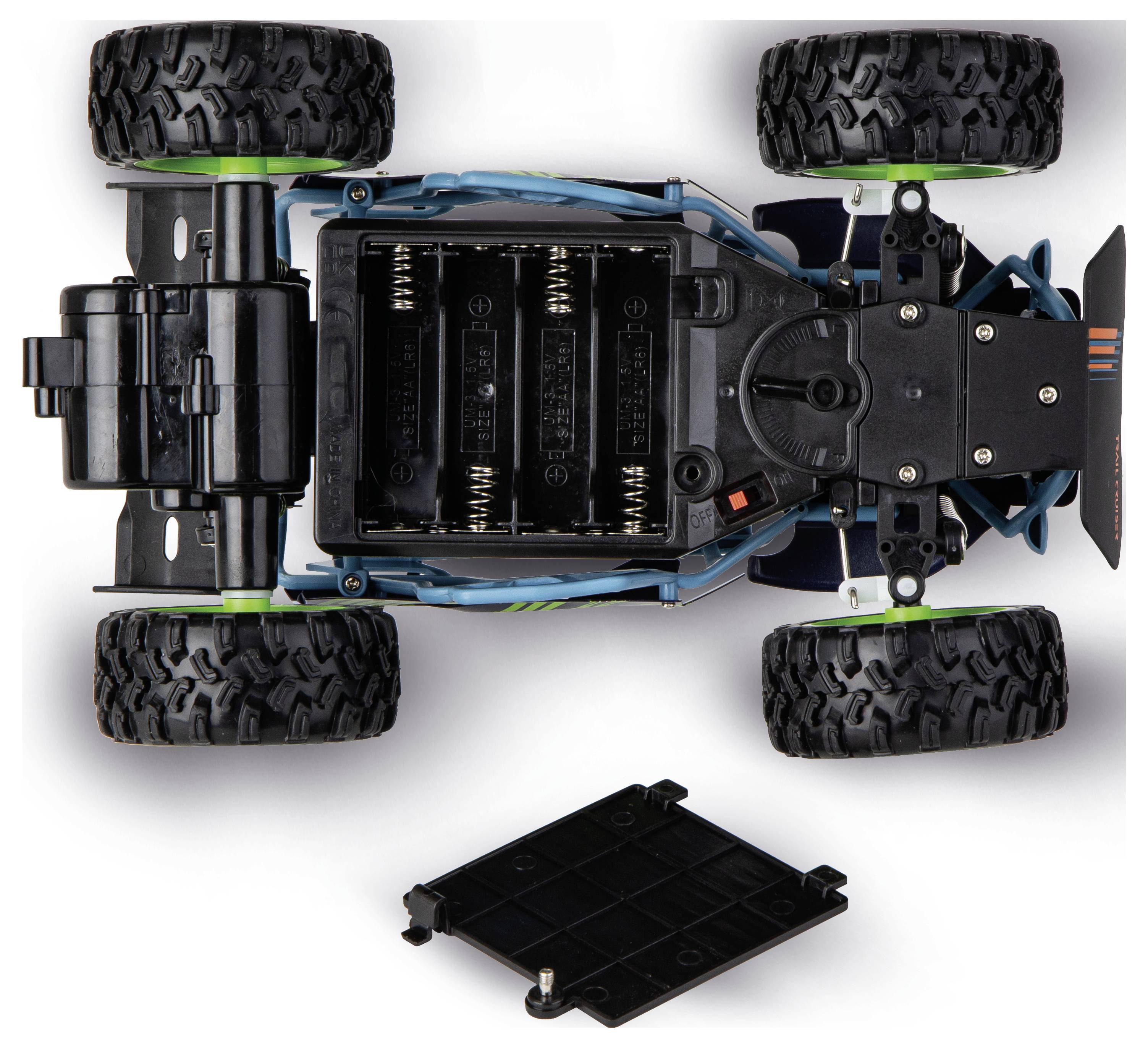 Draufsicht eines ferngesteuerten Geländespielzeugautos mit freiliegendem Batteriefach und einer darunter angebrachten, abgelösten Batterieabdeckung.