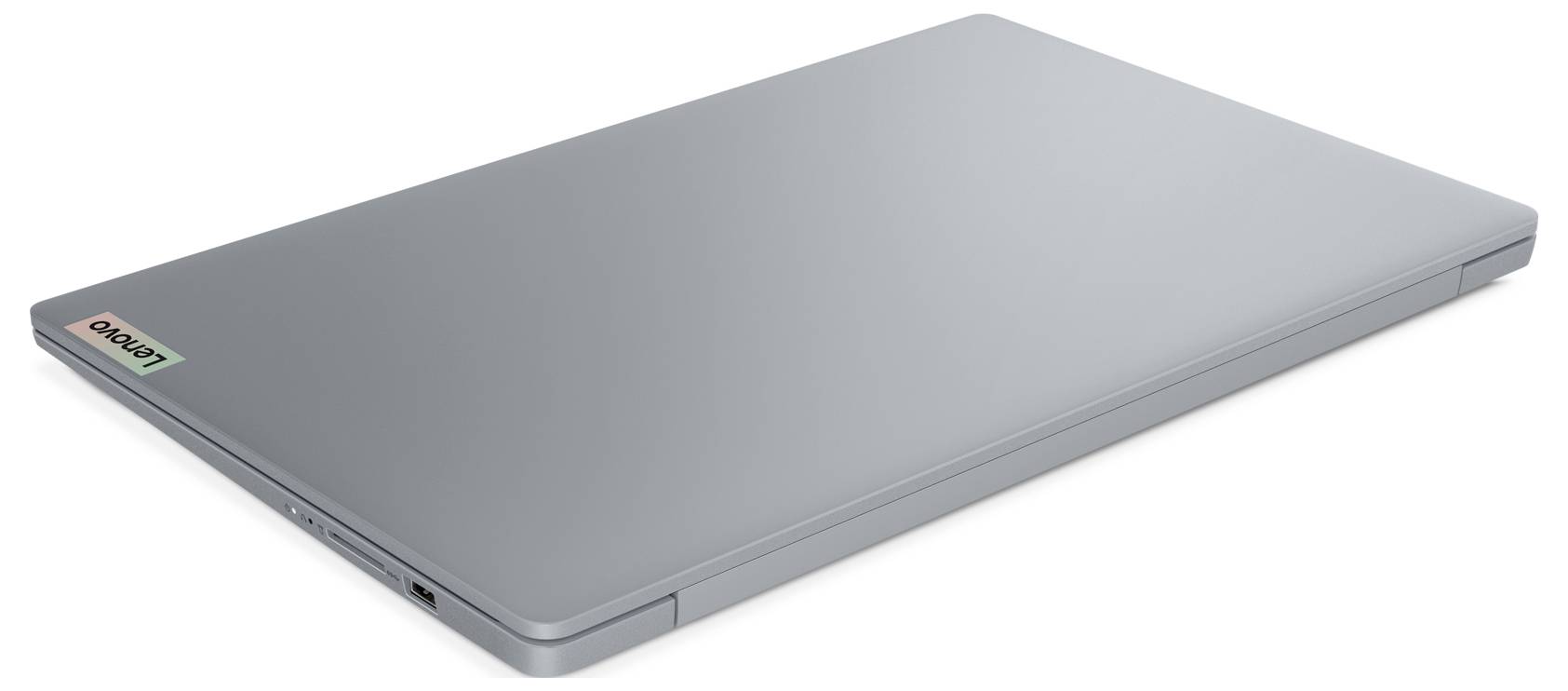 Silberner geschlossener Laptop auf weißem Hintergrund, von oben in einer schräggewinkelten Ansicht gezeigt.