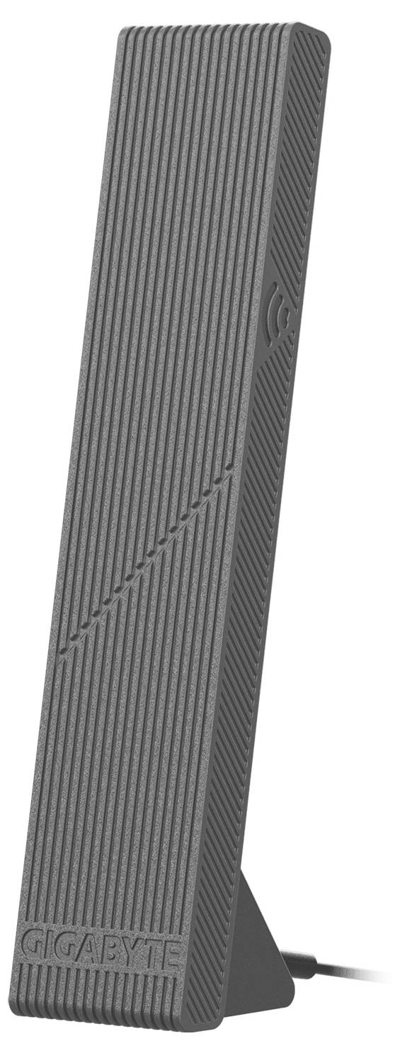Hohe graue gerippte GIGABYTE-Computerzubehör, wahrscheinlich eine externe Antenne oder einen Signalverstärker, aufrecht stehend mit einem Kabel an der Basis angebracht.