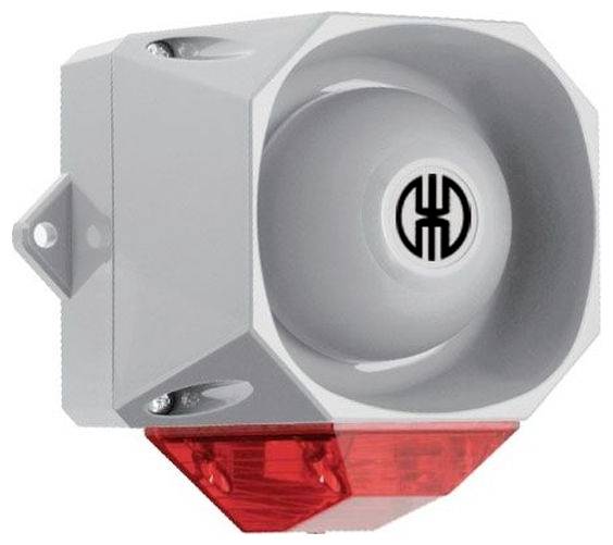Grau montierte Industriealarmsirene an der Wand mit rotem Stroboskoplicht und einem zentralen Logo auf der Vorderseite.
