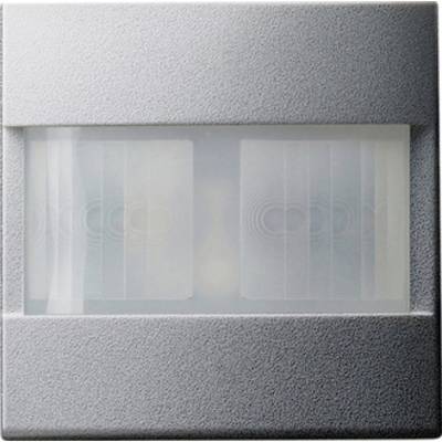 Quadratischer wandmontierter Bewegungssensor mit mattiertem Doppellinsen-Fenster in einem grau strukturierten Gehäuse.