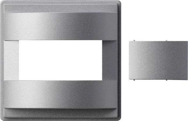 Graue Metallwandplatte mit großer rechteckiger Öffnung, daneben gezeigt mit passendem Abdeckungsblech, wahrscheinlich eine modulare elektrische Blende.