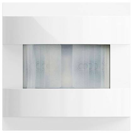 Weiße wandmontierte Leuchte mit rechteckigem Mattglas-Panel und sichtbaren Kreismuster im Inneren.