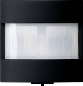 Schwarzes rechteckiges Gerät mit einer mattierten weißen Mitteltafel, auf der zwei schwache kreisförmige Linsen oder Sensoren nebeneinander angezeigt werden.