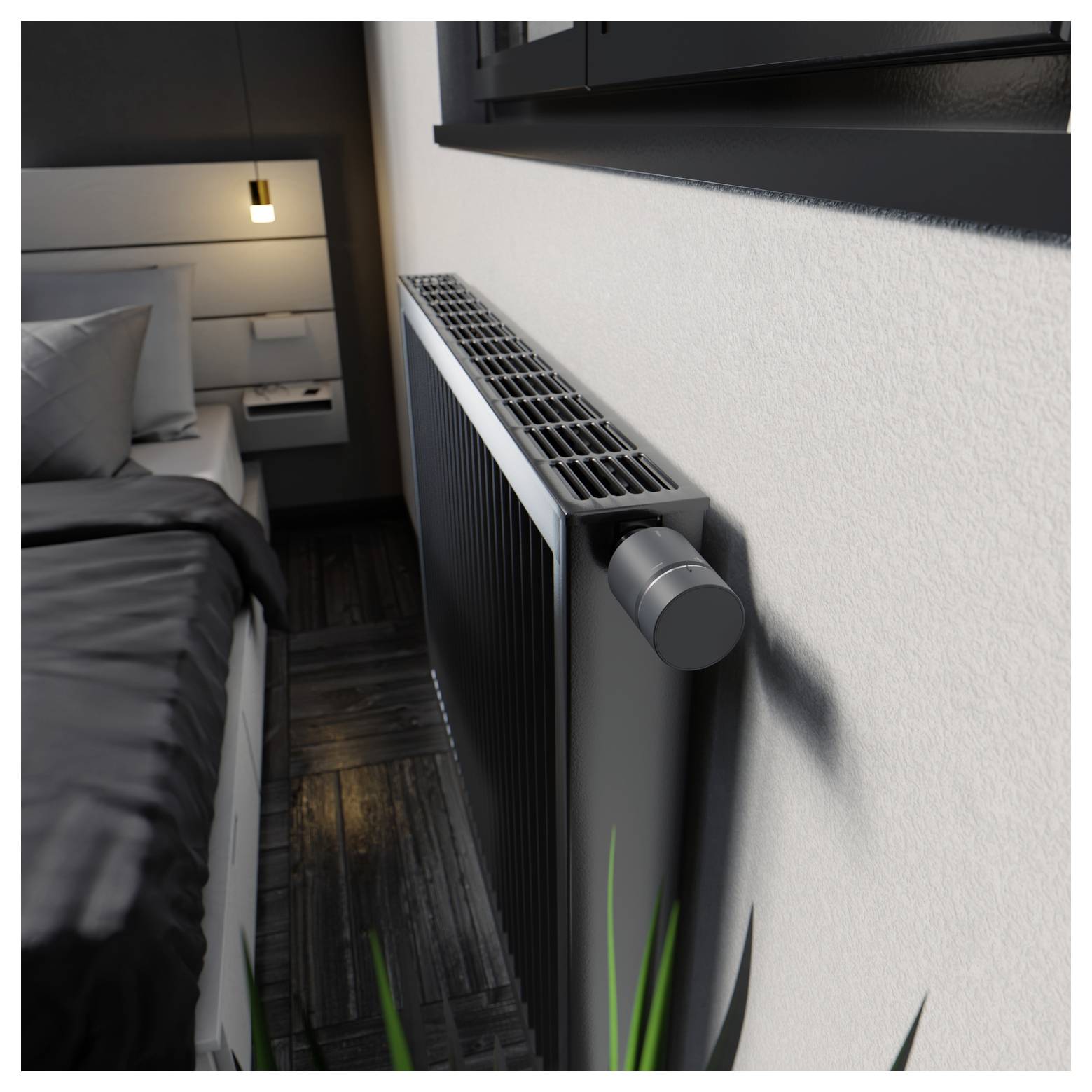 Modernes Schlafzimmer mit einem wandmontierten Heizkörper neben dem Bett und einer Nachttischlampe im Hintergrund.