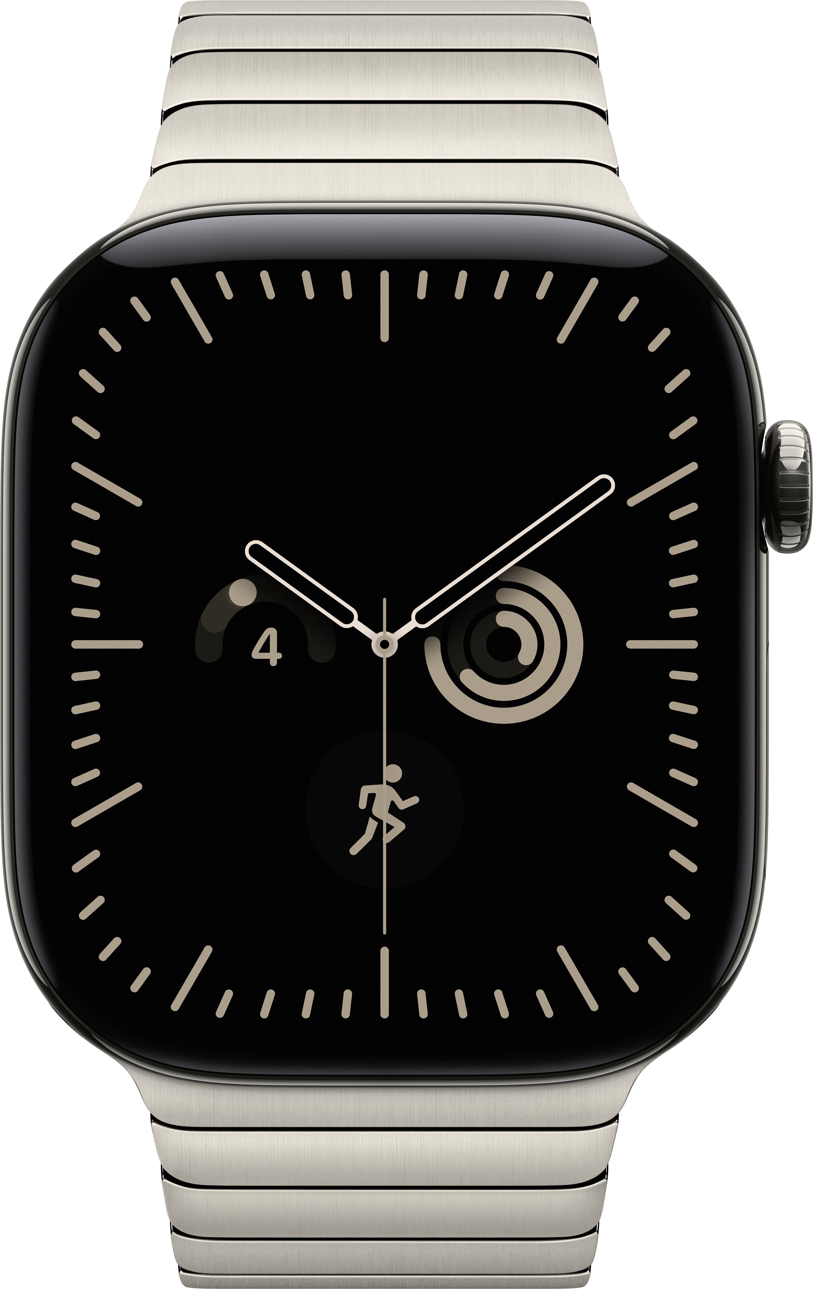 Nahaufnahme einer Apple Watch mit schwarzem Analog-Zifferblatt, beigem Armband und Activity-Ringe-Komplikation, die Fortschritt und ein Trainings-Symbol zeigt.