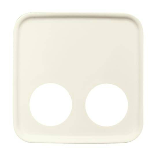 Ein cremefarbenes abgerundetes Quadrat mit zwei weißen kreisförmigen Ausschnitten in der Nähe des unteren Randes, das einem minimalistischen Symbol oder einer Steckdosenblende ähnelt.
