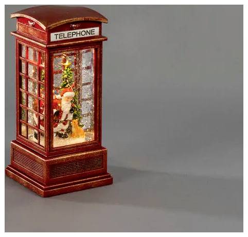 Dekoratives rotes Telefonzellen-Ornament mit miniaturem Weihnachtsmann und Weihnachtsbaum im Inneren, beleuchtet, auf grauem Hintergrund.