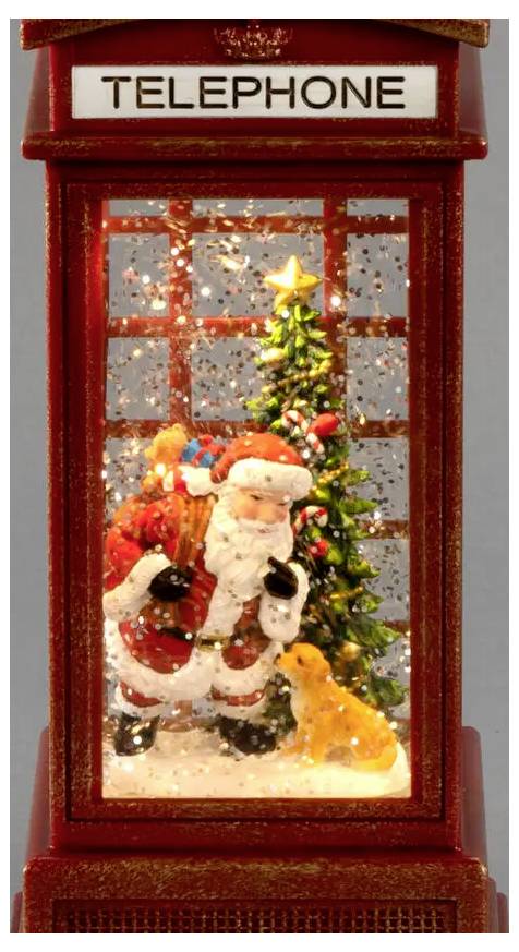 Weihnachtsfigur des Weihnachtsmanns und kleiner Weihnachtsbaum in einer roten Telefonzelle-Ornament mit der Aufschrift „TELEPHONE" oben.