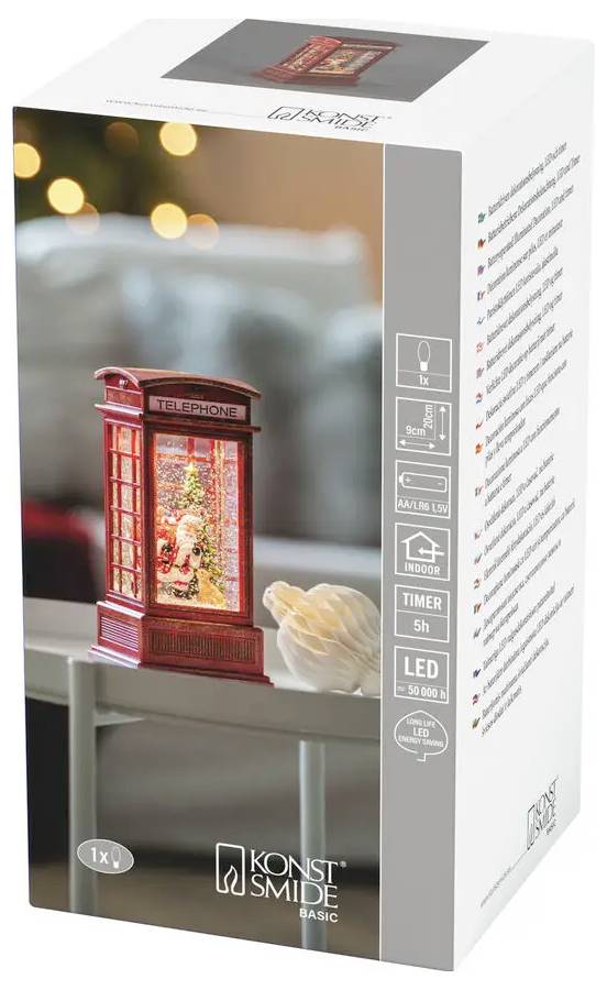 Produktbox für KONSTSMIDE Basic LED-Dekoleuchte, zeigt eine rote Telefonzelle-Szene mit warmem Licht und auf der Seite aufgelistete 5-Stunden-Timer-Funktionen.