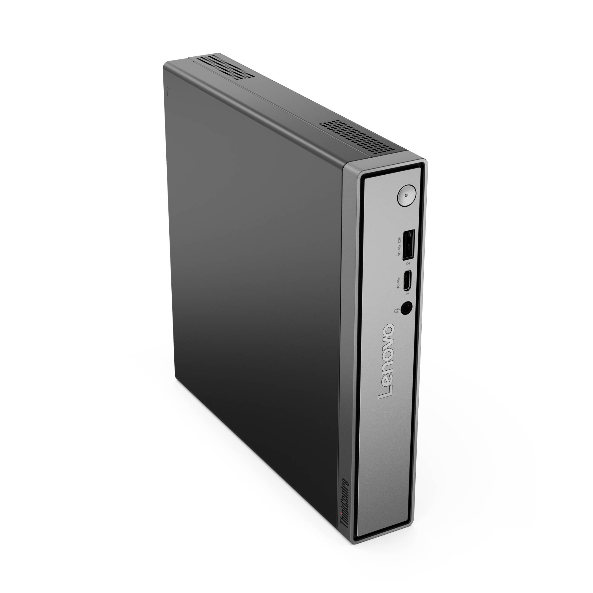 Kompakter Lenovo Mini-Desktop-Computer mit Stromschalter an der Vorderseite, USB-Anschlüssen und Audiobuchse auf schwarzem Gehäuse.